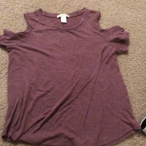 a tank top with off the shoulder sleeves , maroon